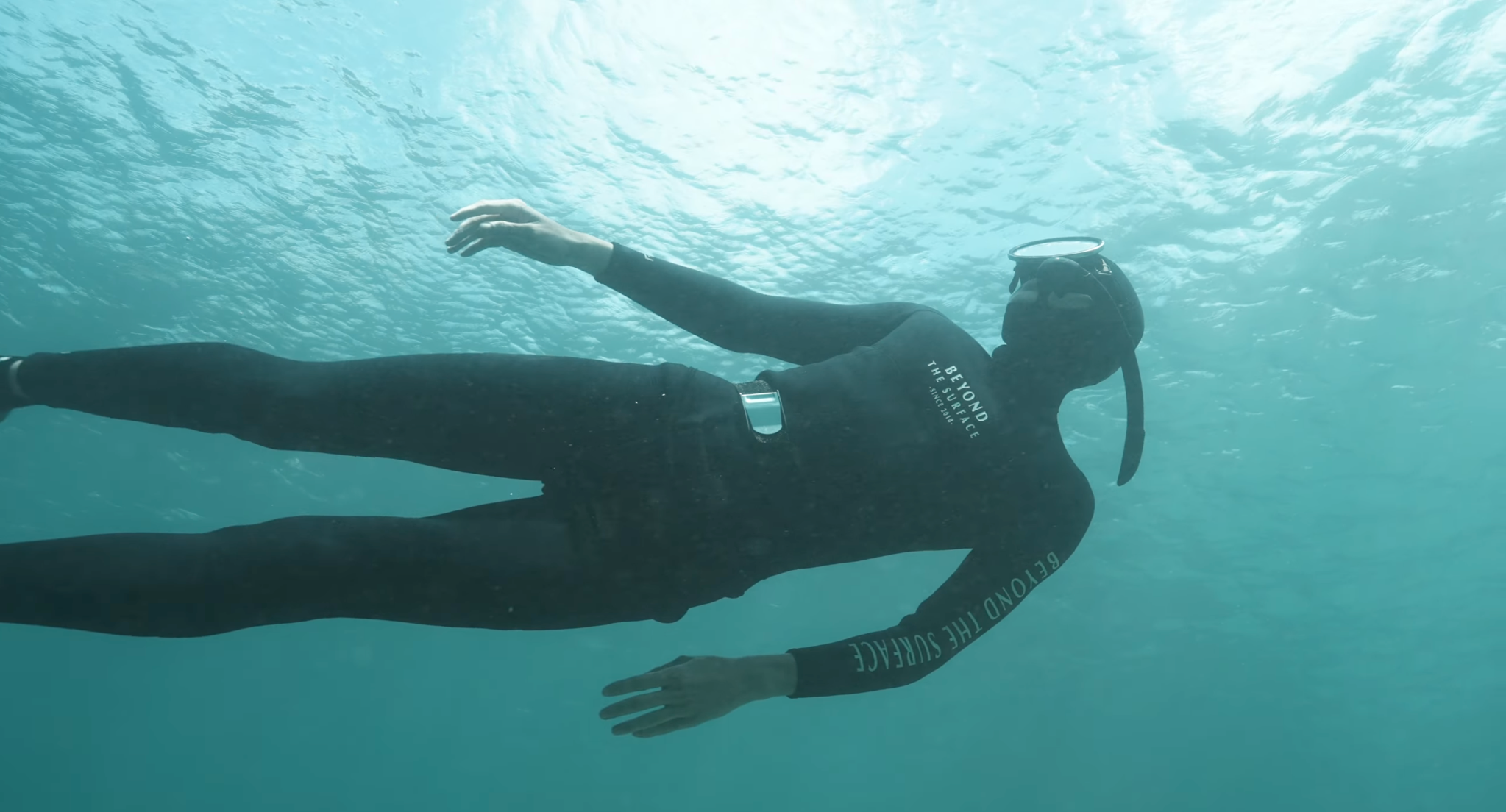 Freediver floating underwater